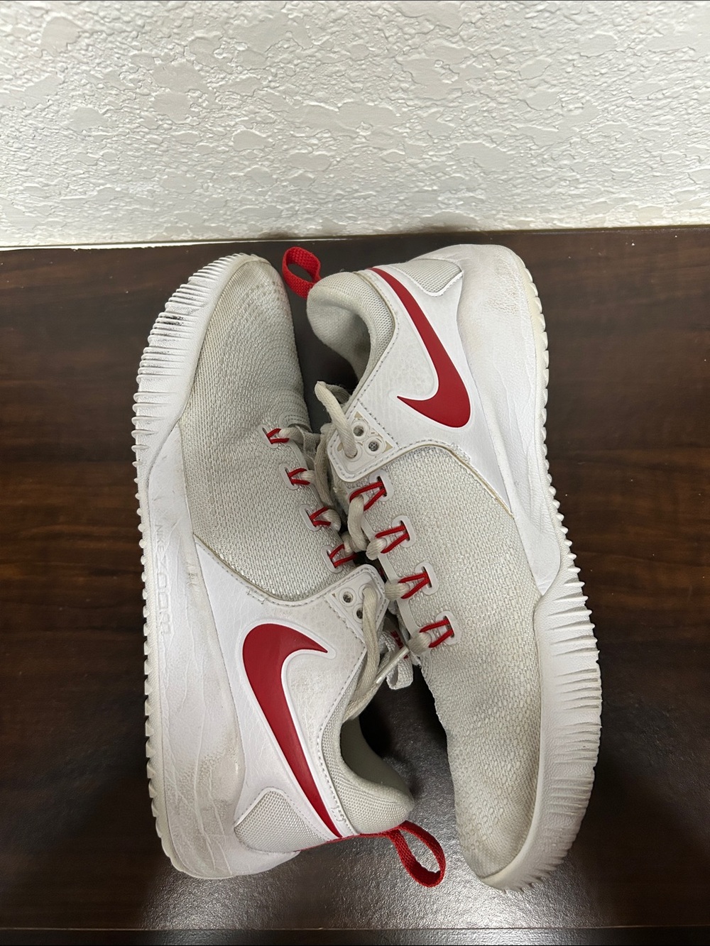 Nike White Sneakers with Red Swoosh and Accents
